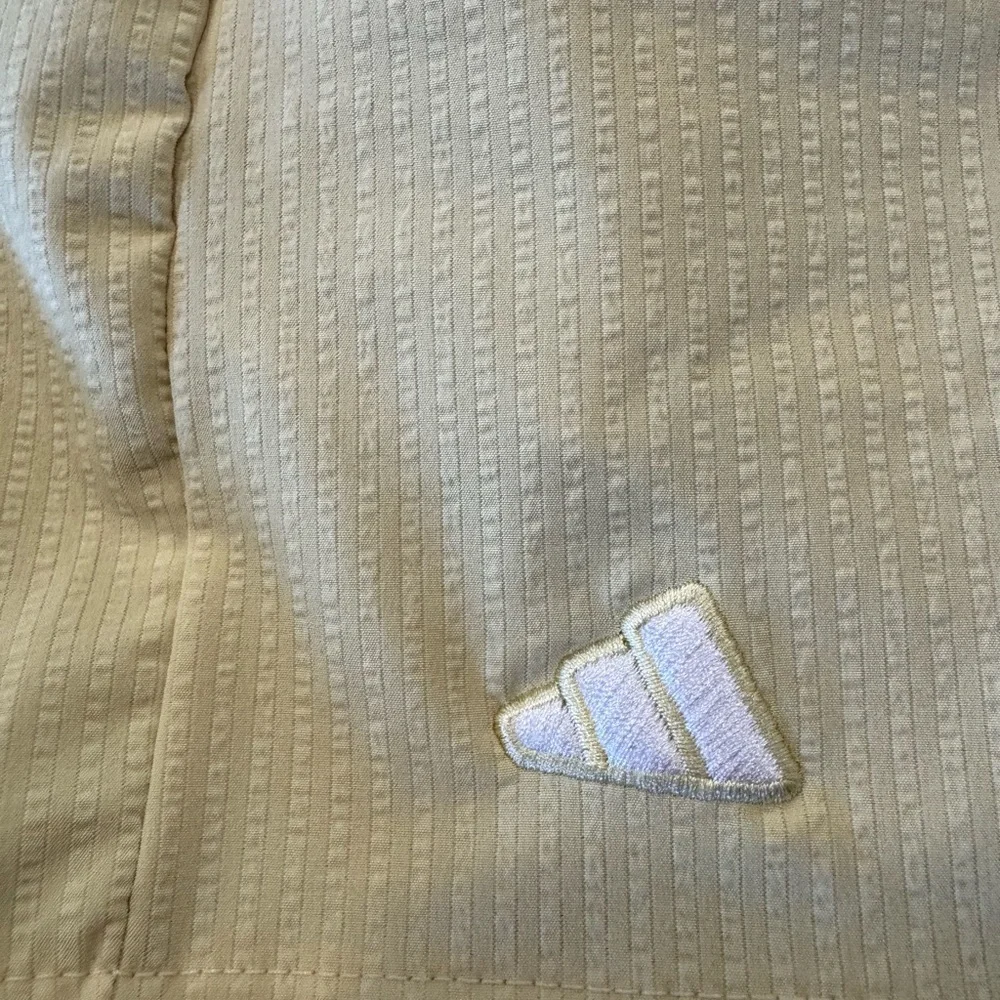 adidas Women’s Pale Yellow Pleated Golf Skort - Picture 2 of 6